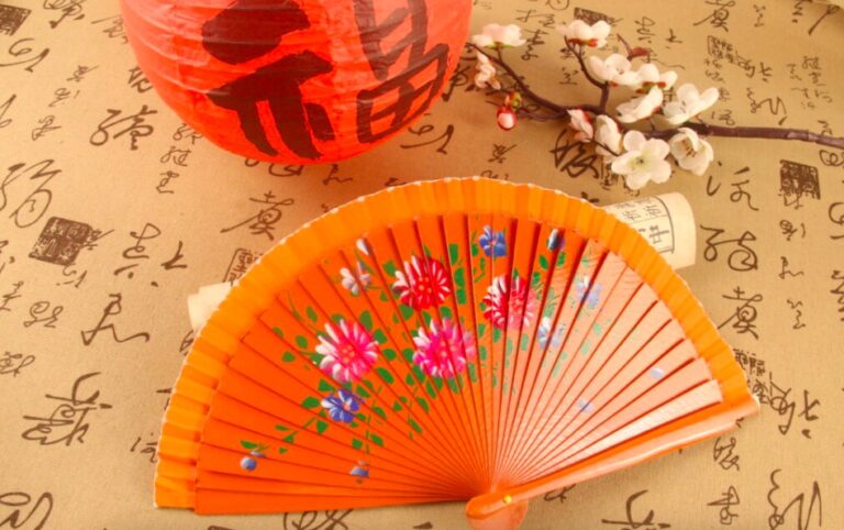 orange hand fan
